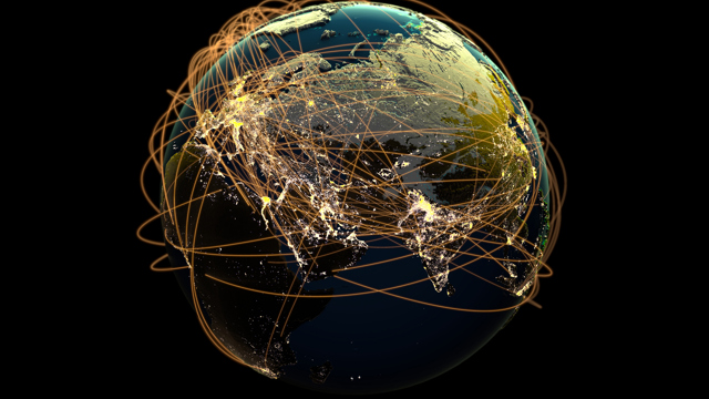 Jordglob med linjer som representerar global kommunikation