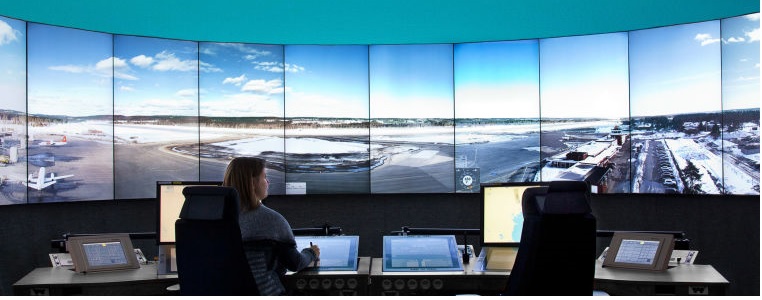 Remote airport control, view of many displays together showing a huge image of the actual airport to the controller