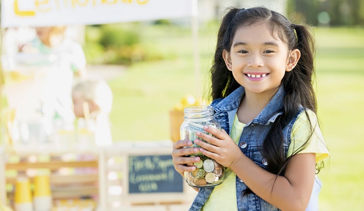 Little girl selling lemonade