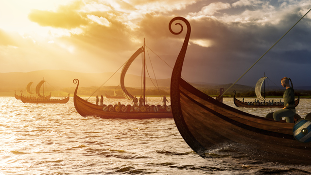 Picture of a viking ship sailing in sunset