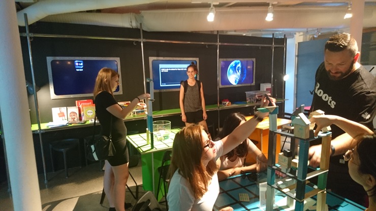 The students get their hands on the interactive exhibitions at Visualization Center C.