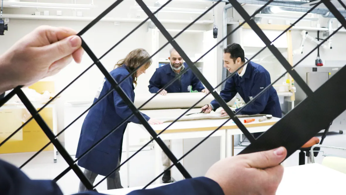 Researchers working in lab.
