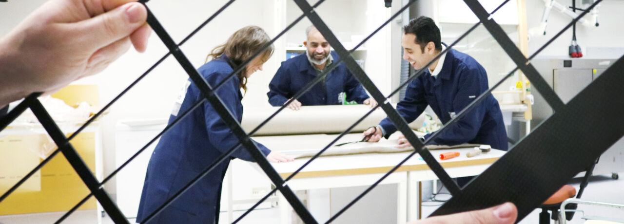 Researchers working in lab.