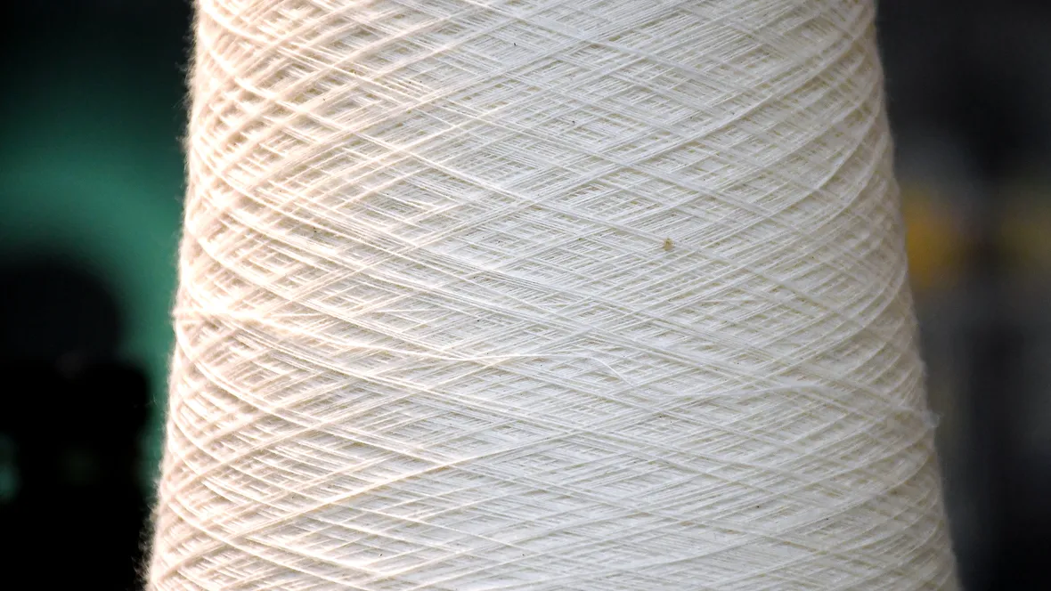 Cotton thread on a roll. 