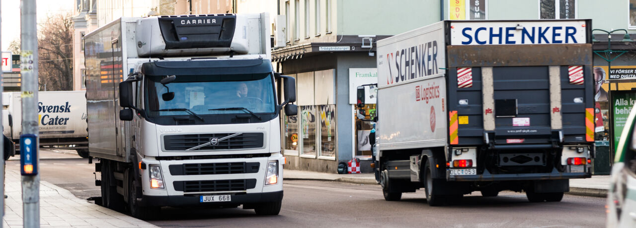 Transport trucks in city environment