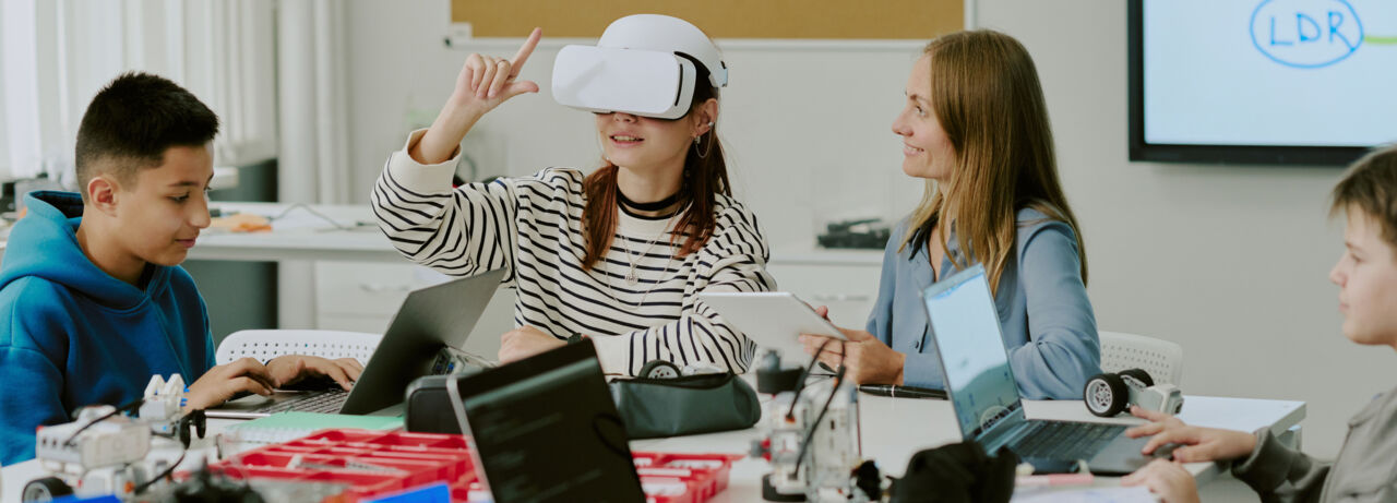 A pubil wearing vr glasses in a classroom