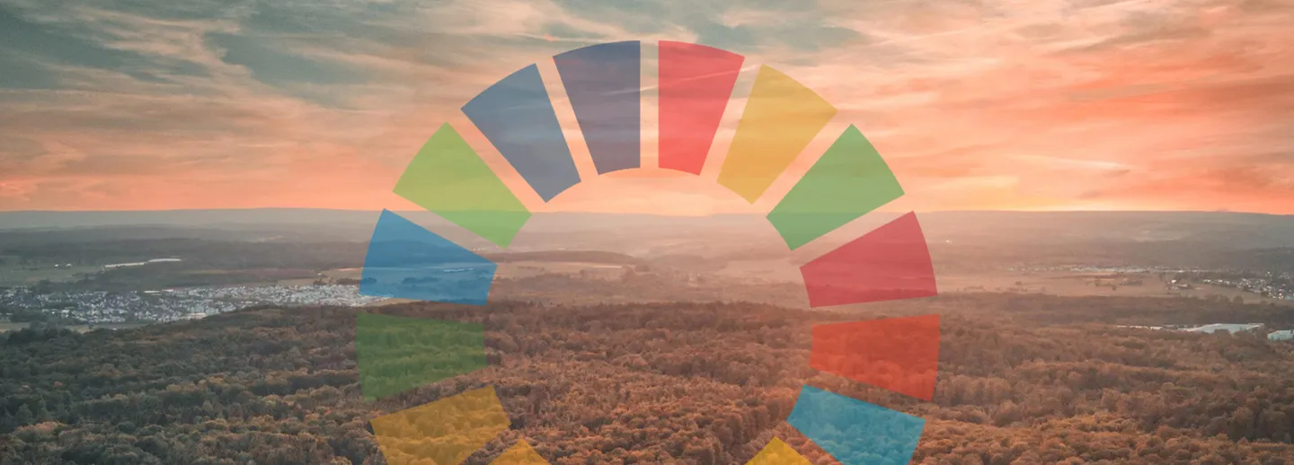 sky with a circle of colourful fields in front