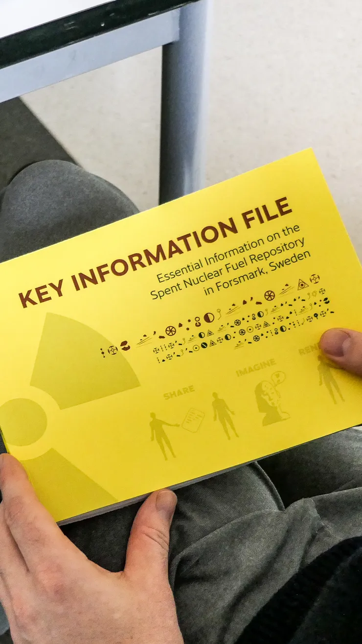 A document with yellow cover and the title the Key Information File.