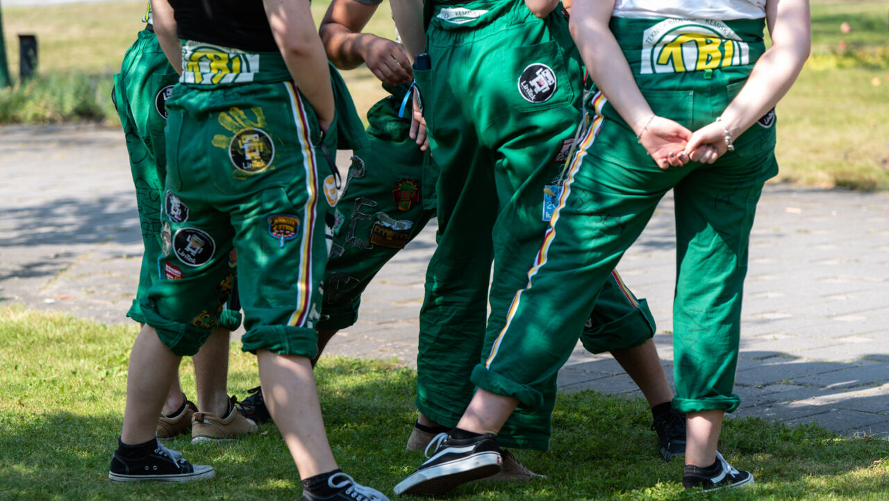 Students wearing overalls