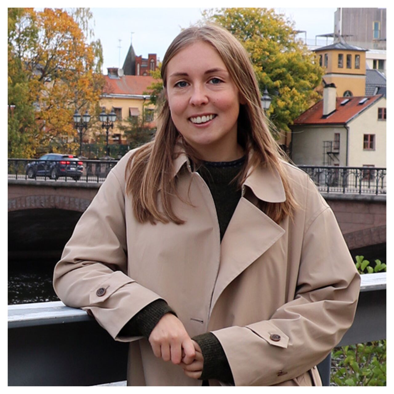 Episode guest Katarina Sandberg is standing outside and smiling into the camera.