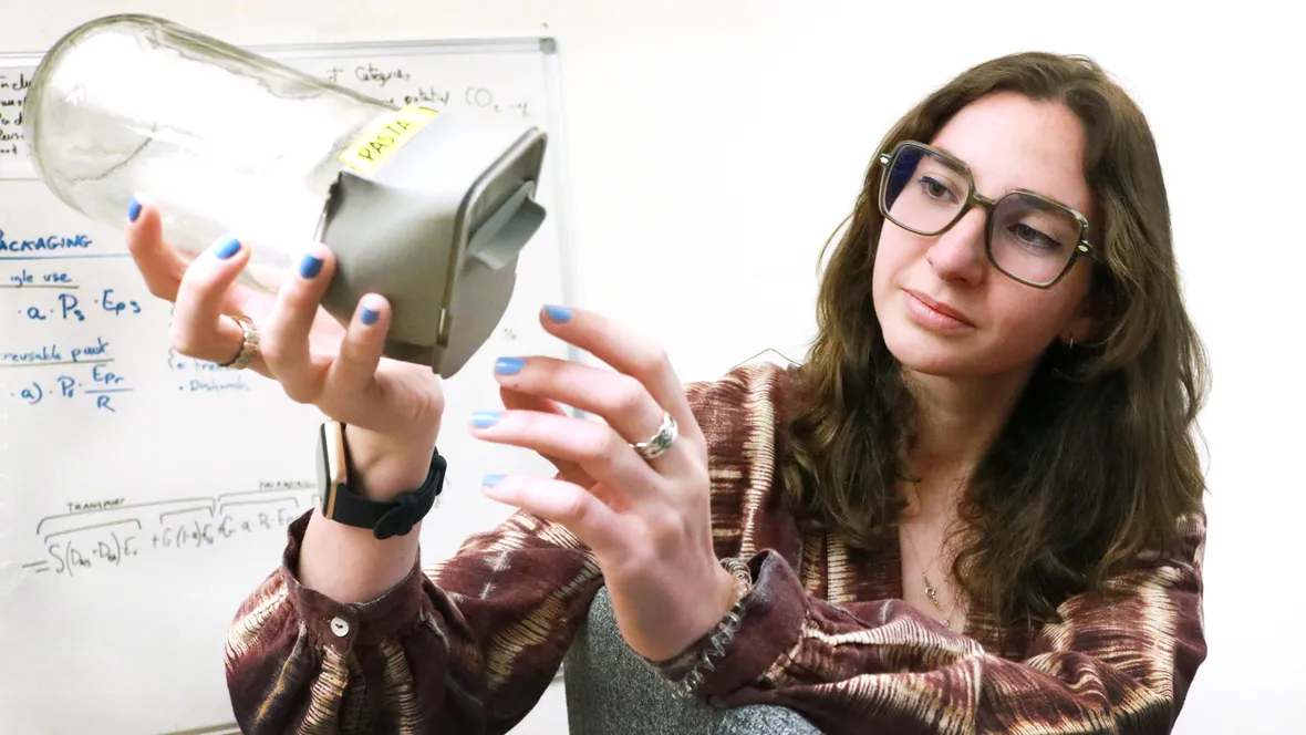 Female PhD-student, brown hair.