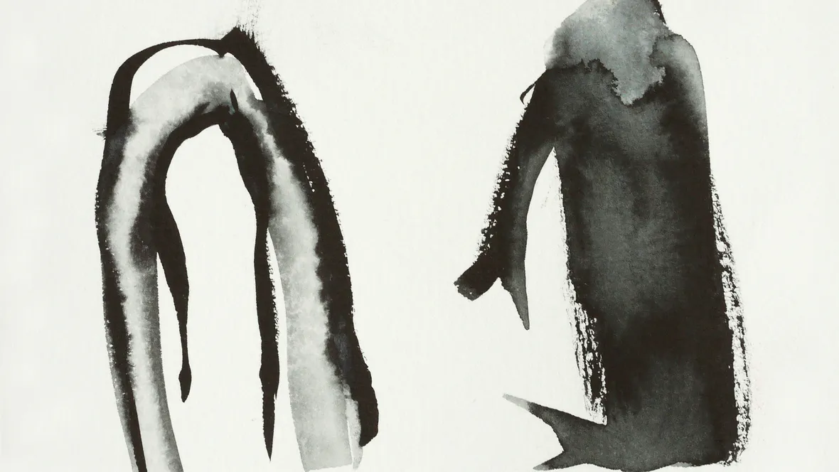 Two abstract ink blotches on white background