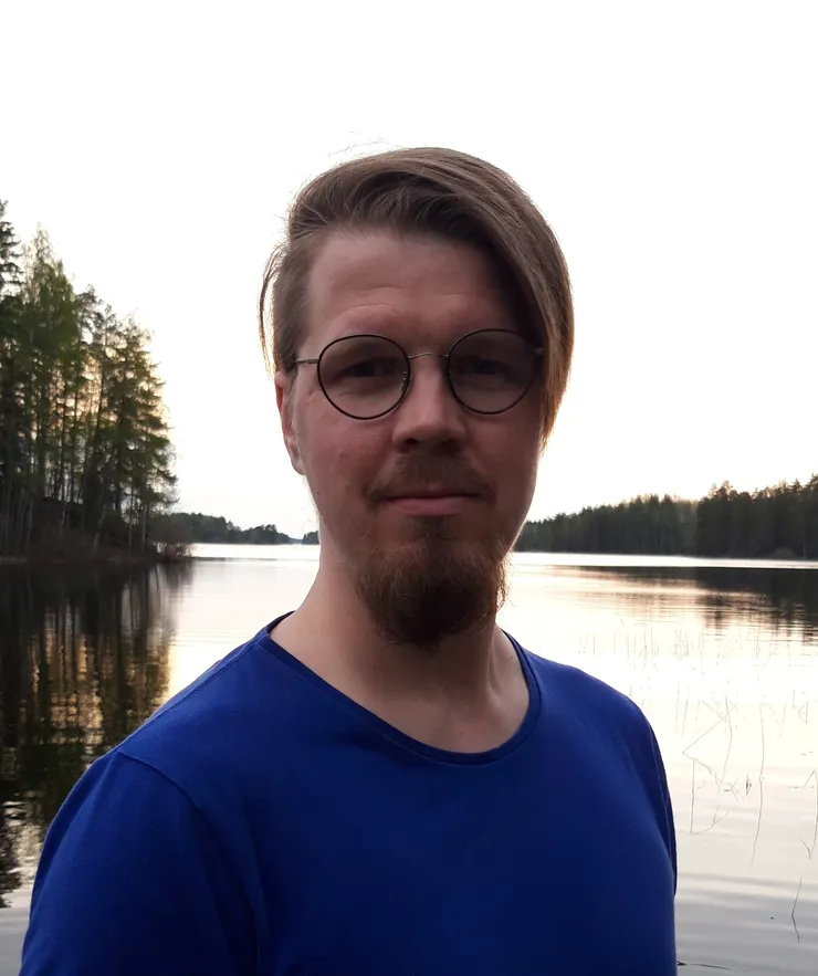 Headshot in front of a lake