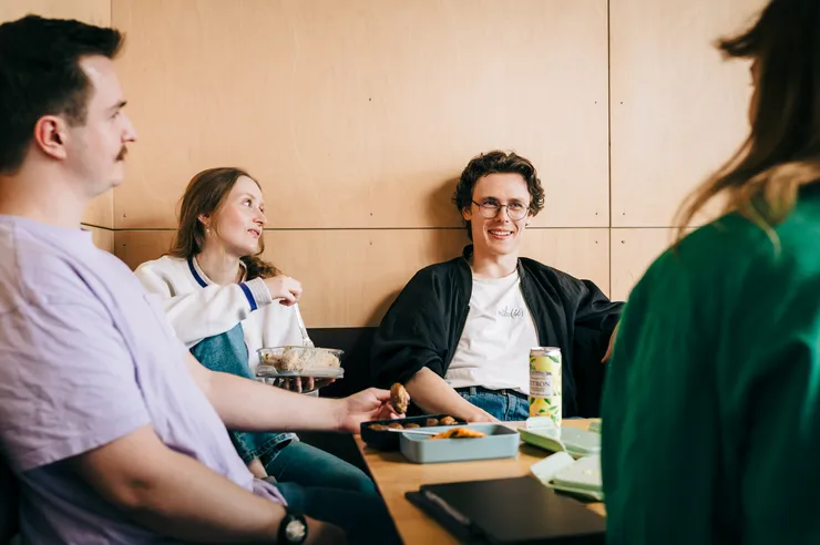 People sit around a table