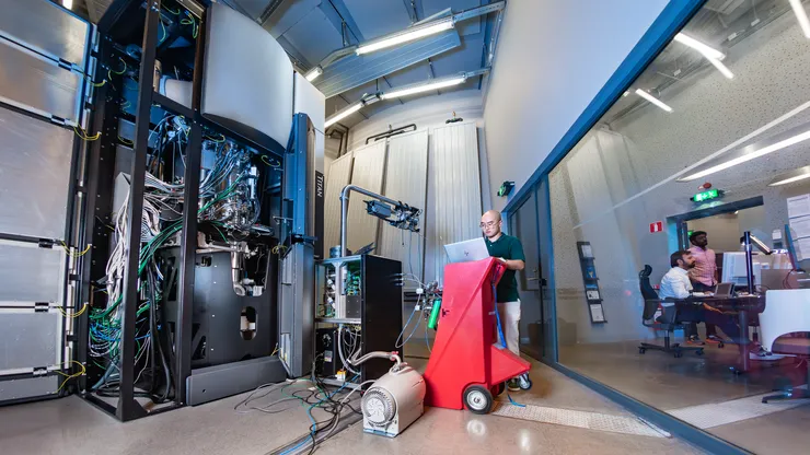 Person with transmission electron microscope.