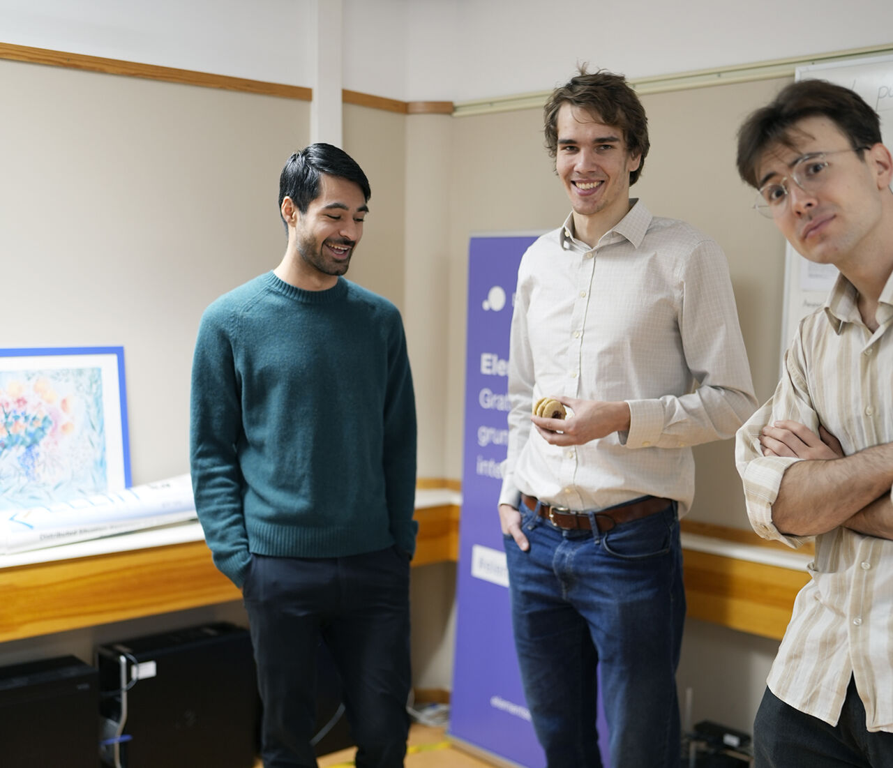 three students chatting