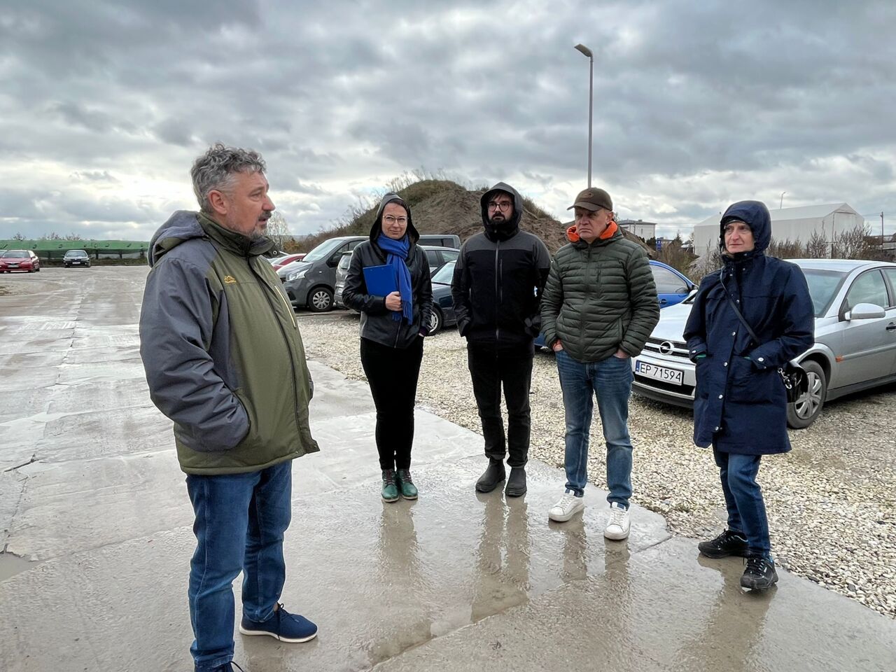 People on a parting lot