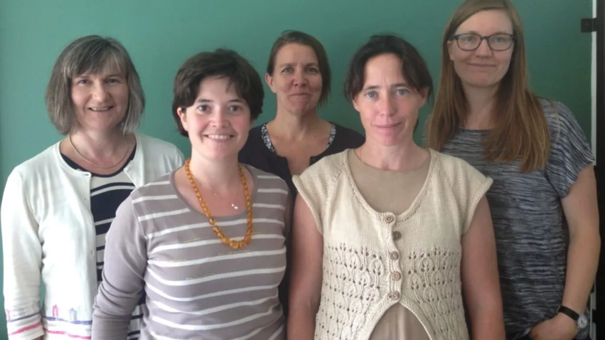 group photo of smiling people