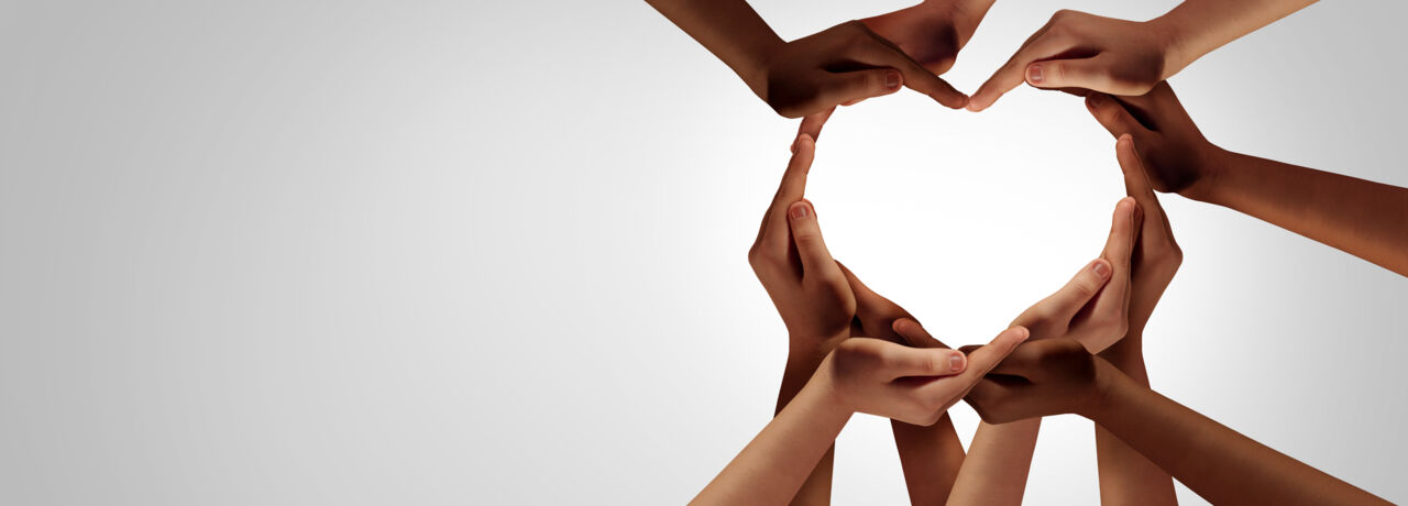 Hands shaping hearts.