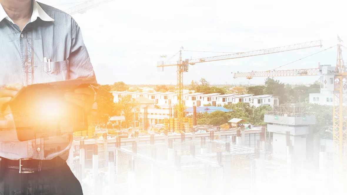 Kollage av man med surfplatta och byggplats