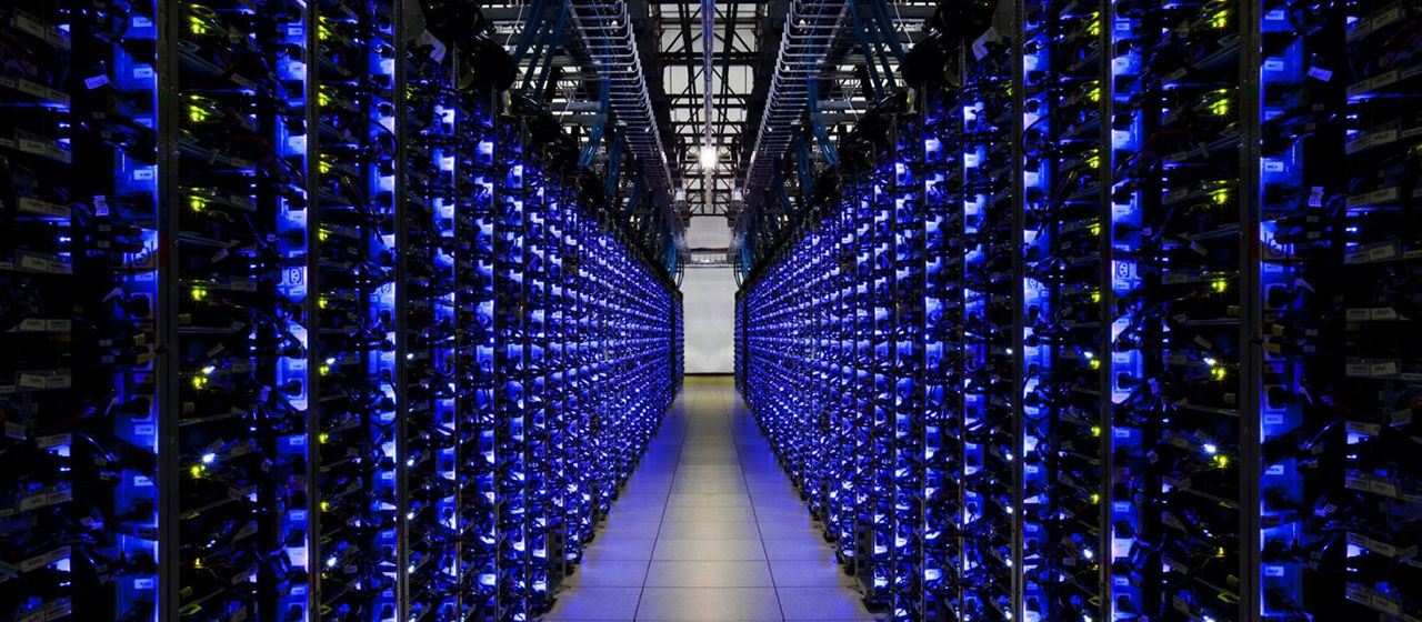 A corridor with computer servers.