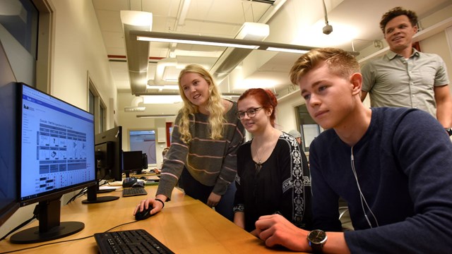 Students in front of computer