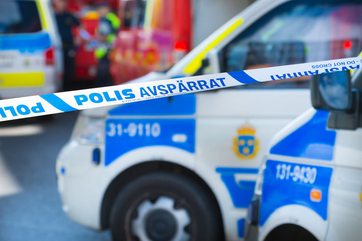 Stockholm, Sweden - May 29, 2012: Ambulances and police cars gathering. Just after some emergency or accident happened in central Stockholm. Police line, tape, do not cross