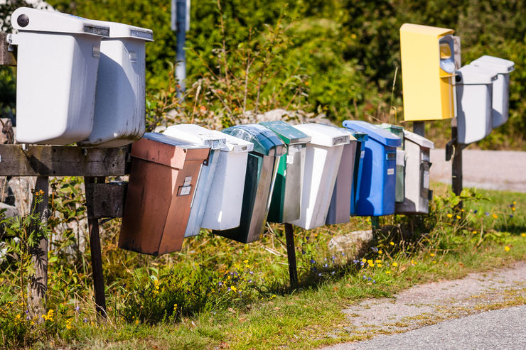 Mailboxes in a row on the Swedish countryside reminds  all Swedes about summer and vacation when time is not a factor more than when to have another cup of coffee and a cinnamon roll.