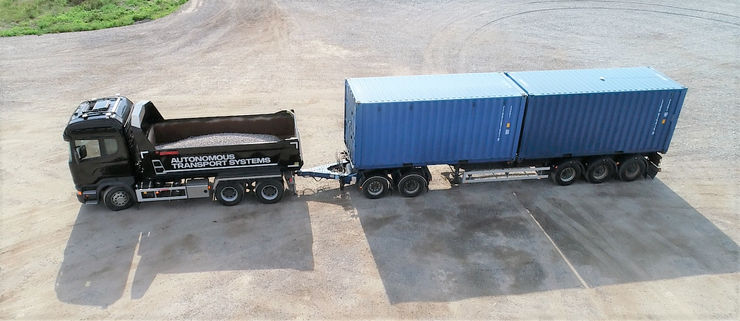 A truck with a dolly and a trailer on Scania’s test track