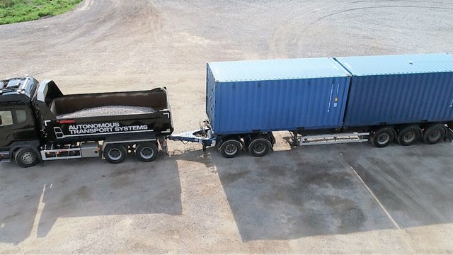A truck with a dolly and a trailer on Scania’s test track