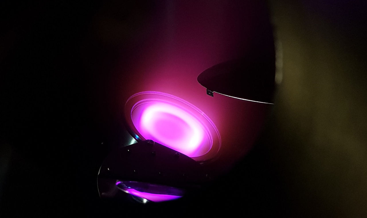 The image shows a plasma in a coating equipment