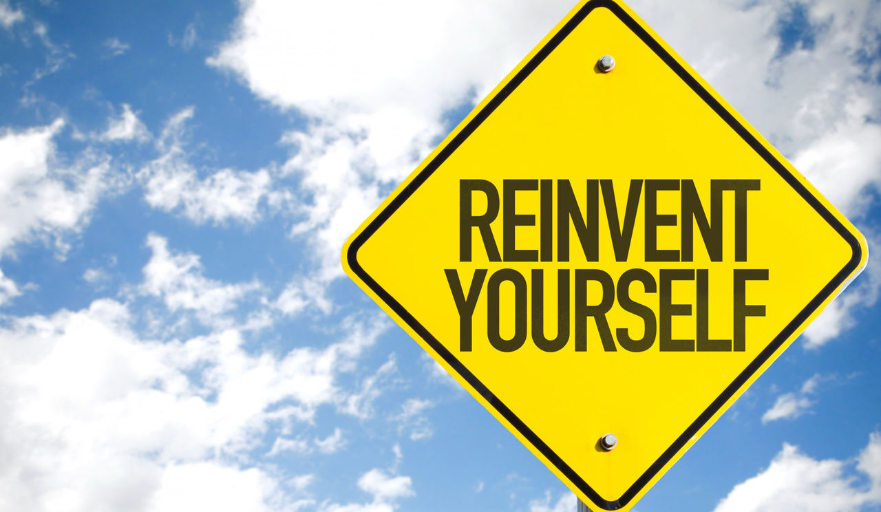 Sign with the text Reinvent yourself