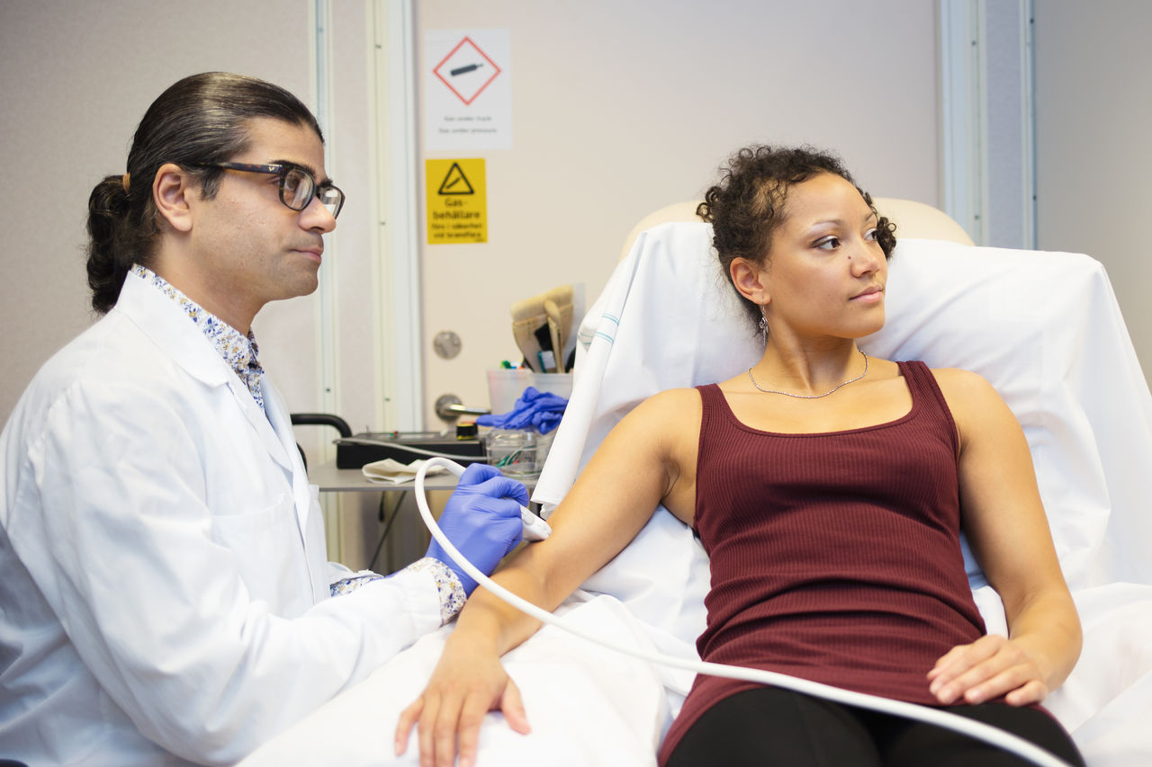 a researcher uses ultrasound to detect nerves in the arm