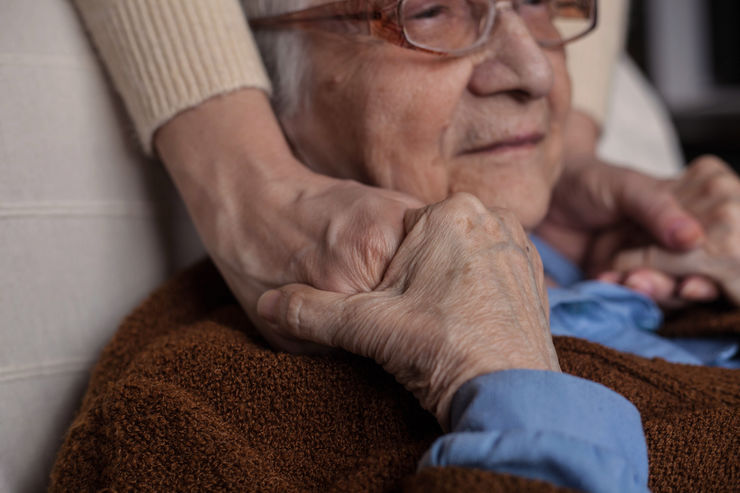 Old senior woman with her granddaughter.