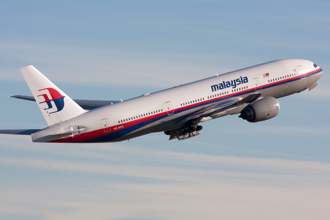ZÃ¼rich, Switzerland - December 05, 2007: Malaysia Airlines Boeing 777-200/ER departing Zurich airport. On 08 March 2014 this aircraft crashed as flight MH 370 from Kuala Lumpur to Beijing.