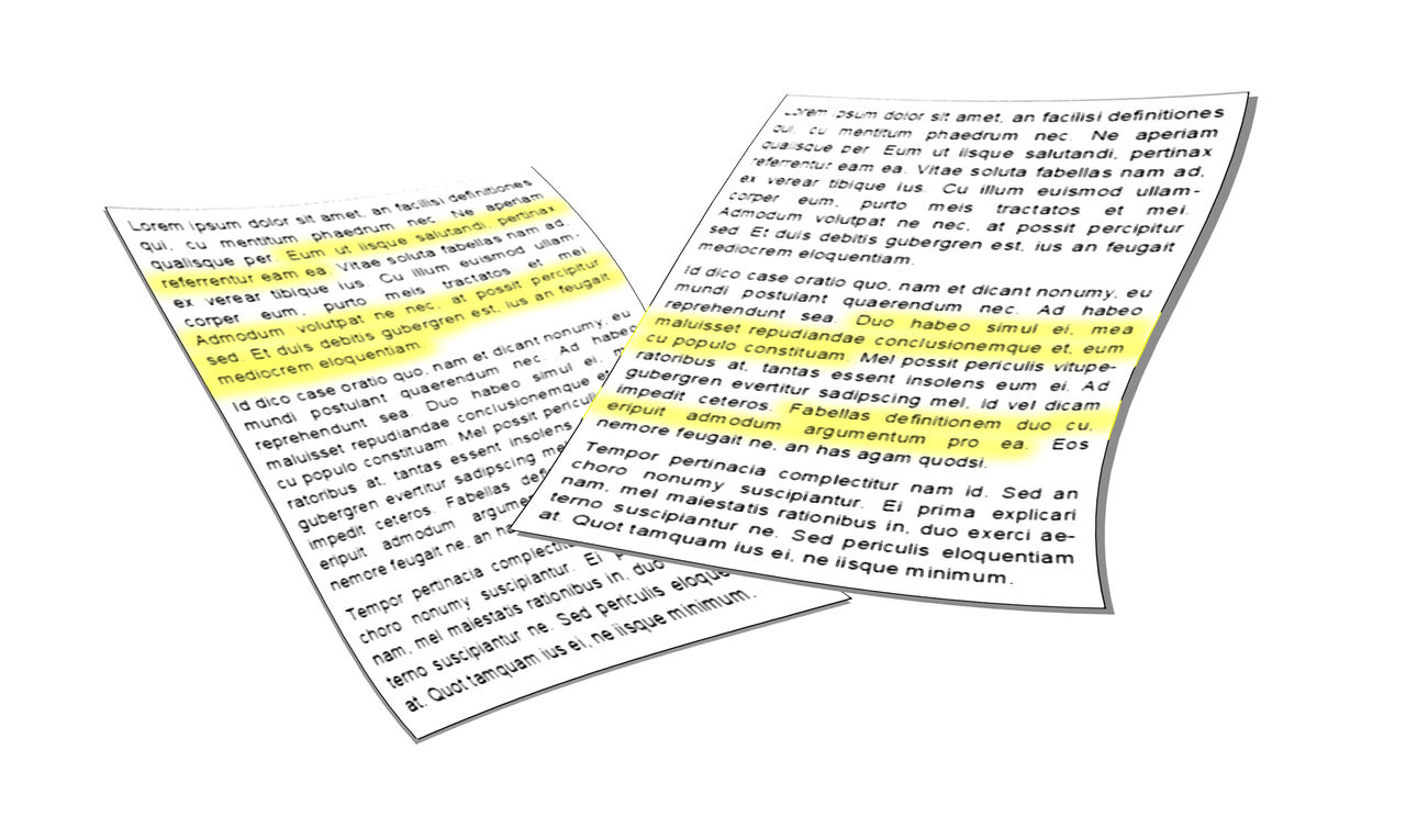 Two documents with some of the text marked with a colouring pen.