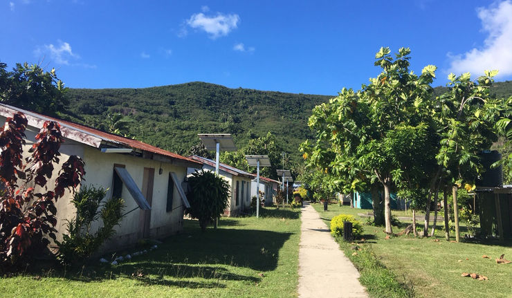 Solar cells on the houses in a village in Fiji.