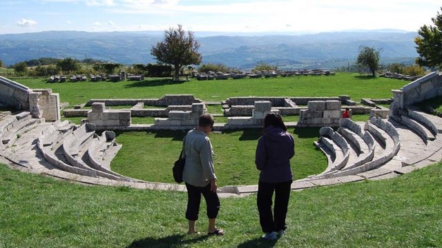 Amphitheatre and two women.