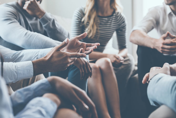 Hands and gestures of a group of discussing people.