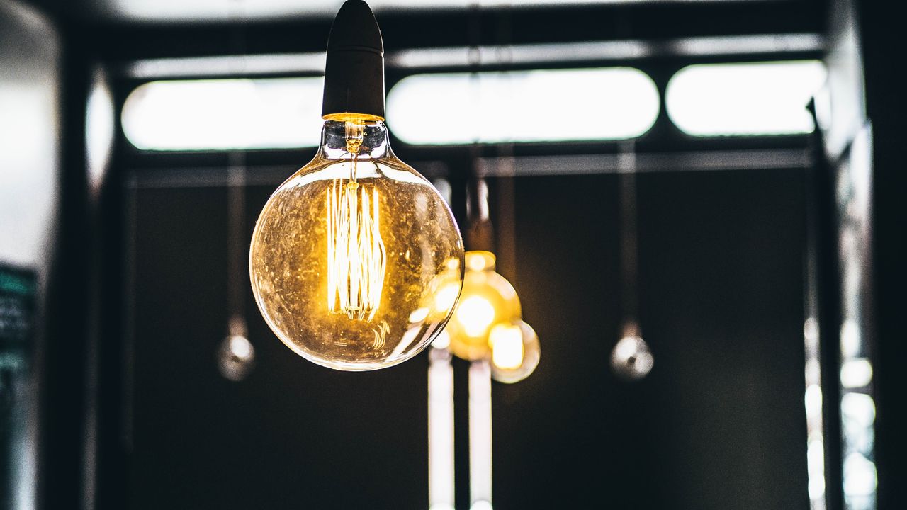 Bright light bulb hangs from the ceiling.