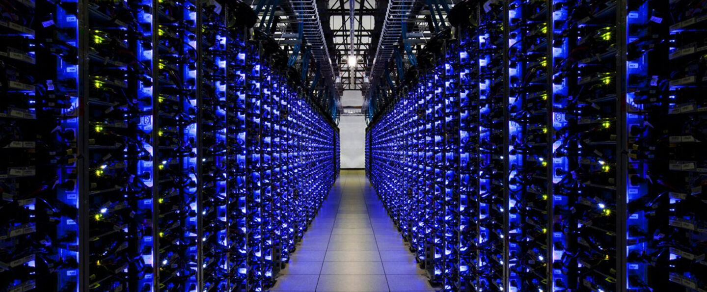 A corridor with computer servers.