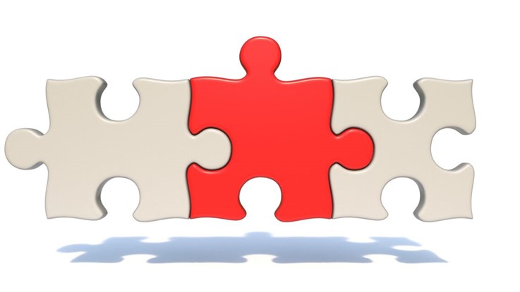 Three puzzle pieces that fit together.