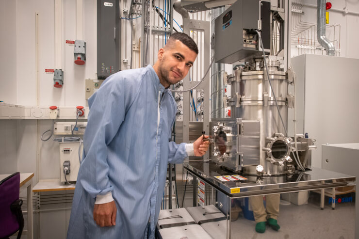 Doctoral student Polla Rouf at the ALD reactor, used to create thin films of indium nitride.