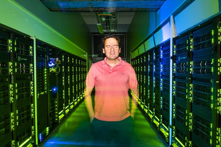 Bo Durbeej standing in a hall with super computers