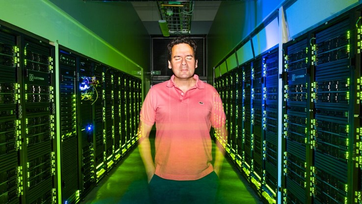 Bo Durbeej standing in a hall with super computers
