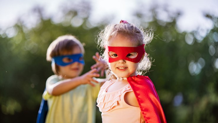 Kids dressed as superheroes.