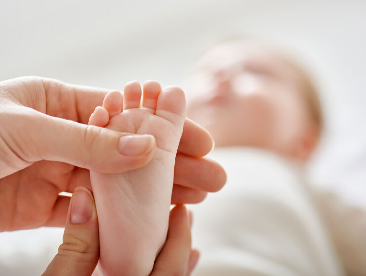 An infant's foot,