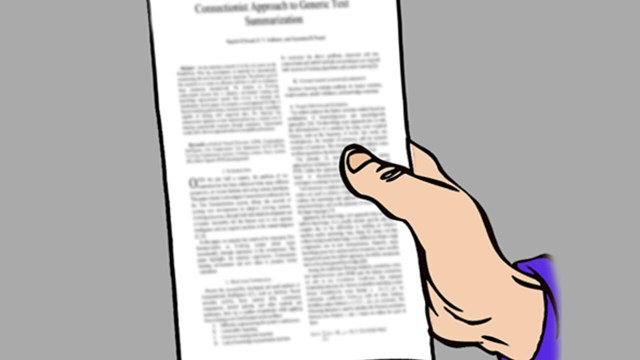 A hand holding a document.
