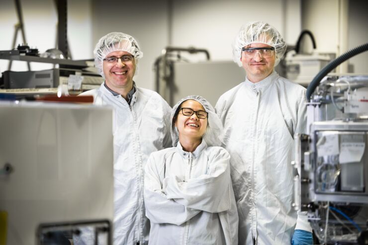 Xavier Crispin, Canyan Che and Mikhail Vagin in the clean room.