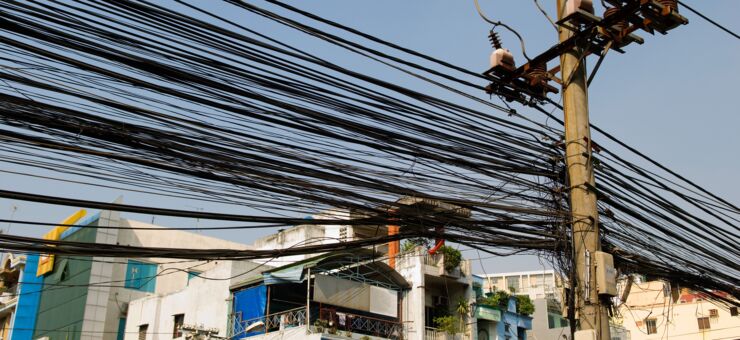 Large Group of Power Lines in City